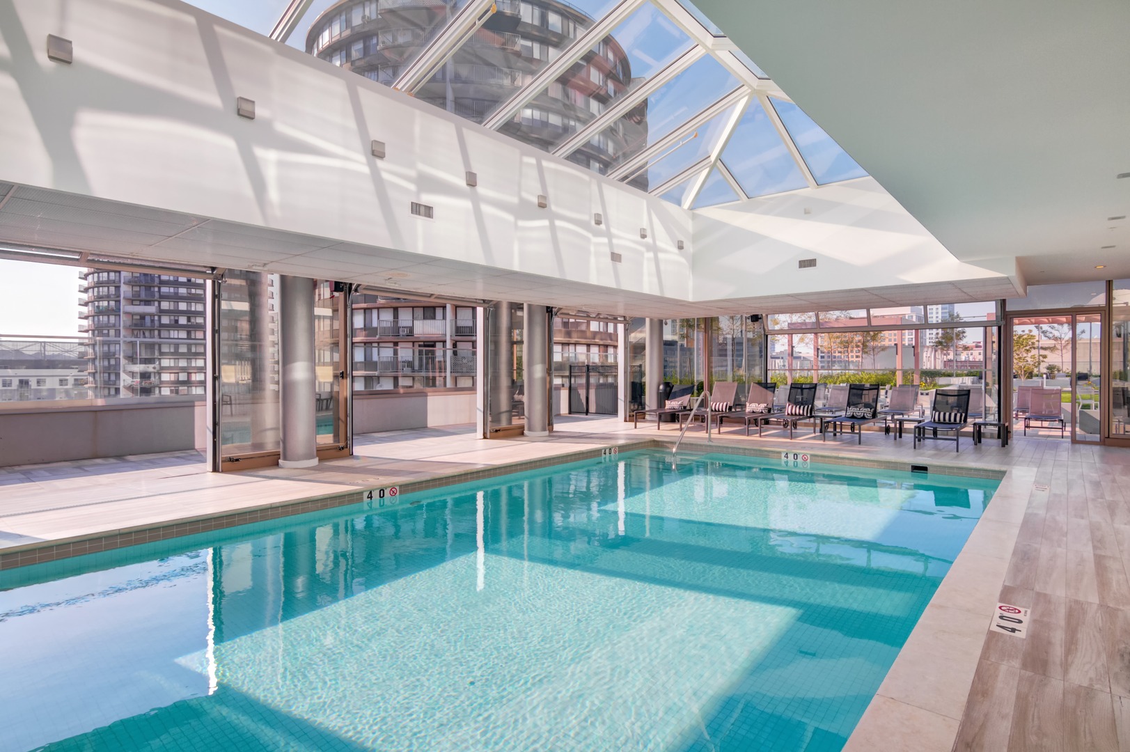 A serene, resort-style pool offering year-round relaxation and wellness